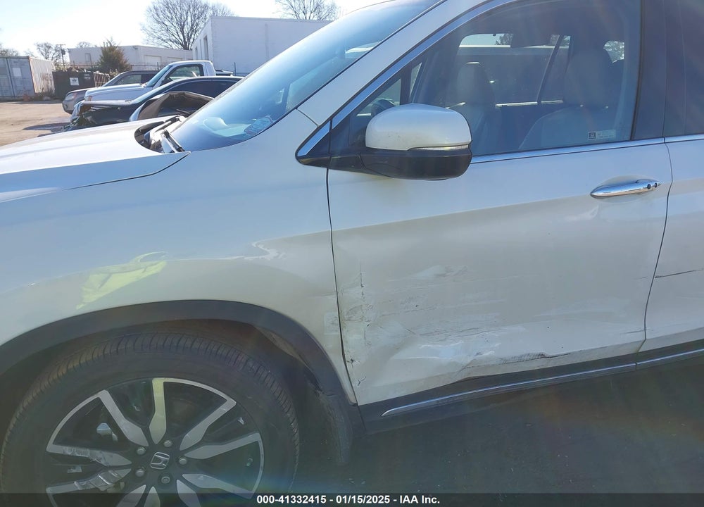 2021 HONDA PILOT 2WD TOURING 7 PASSENGER VIN: 5FNYF5H64MB031671