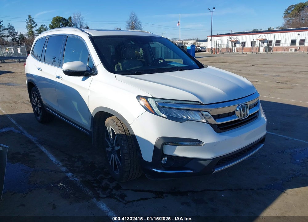 2021 HONDA PILOT 2WD TOURING 7 PASSENGER VIN: 5FNYF5H64MB031671
