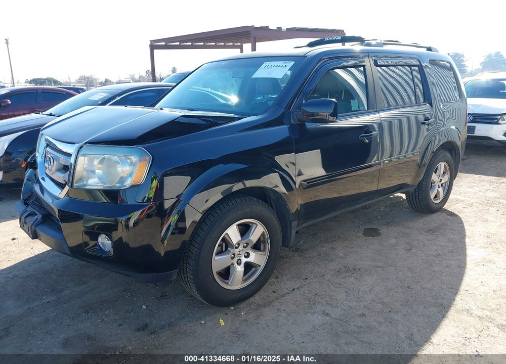 2011 HONDA PILOT EX-L VIN: 5FNYF4H59BB039876