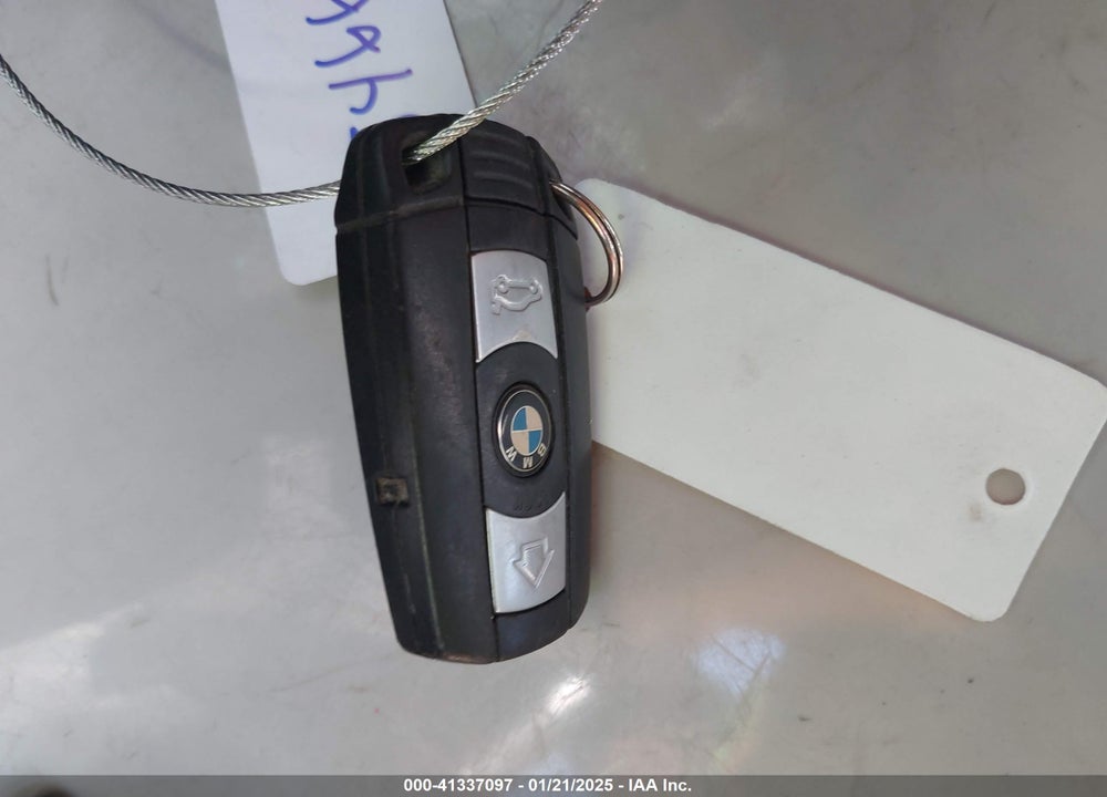 2009 BMW 128I VIN: WBAUP73549VK74523
