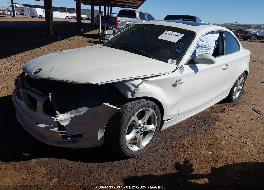 2009 BMW 128I VIN: WBAUP73549VK74523