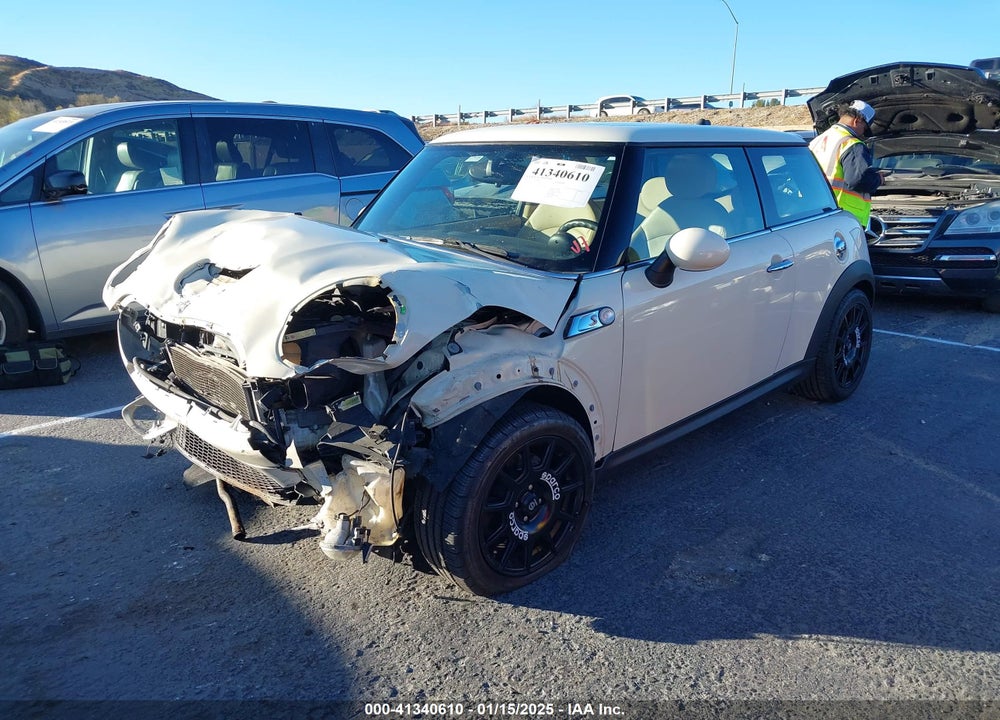 2007 MINI COOPER S VIN: WMWMF73597TT82731