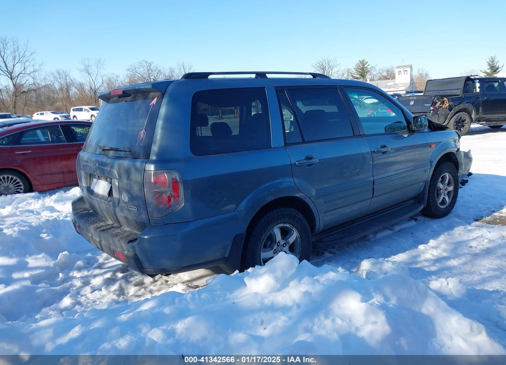 2007 HONDA PILOT EX-L VIN: 5FNYF18587B013744