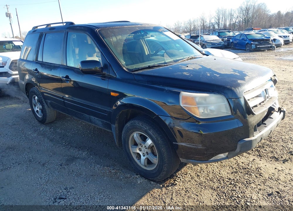 2007 HONDA PILOT EX-L VIN: 5FNYF18577B011872