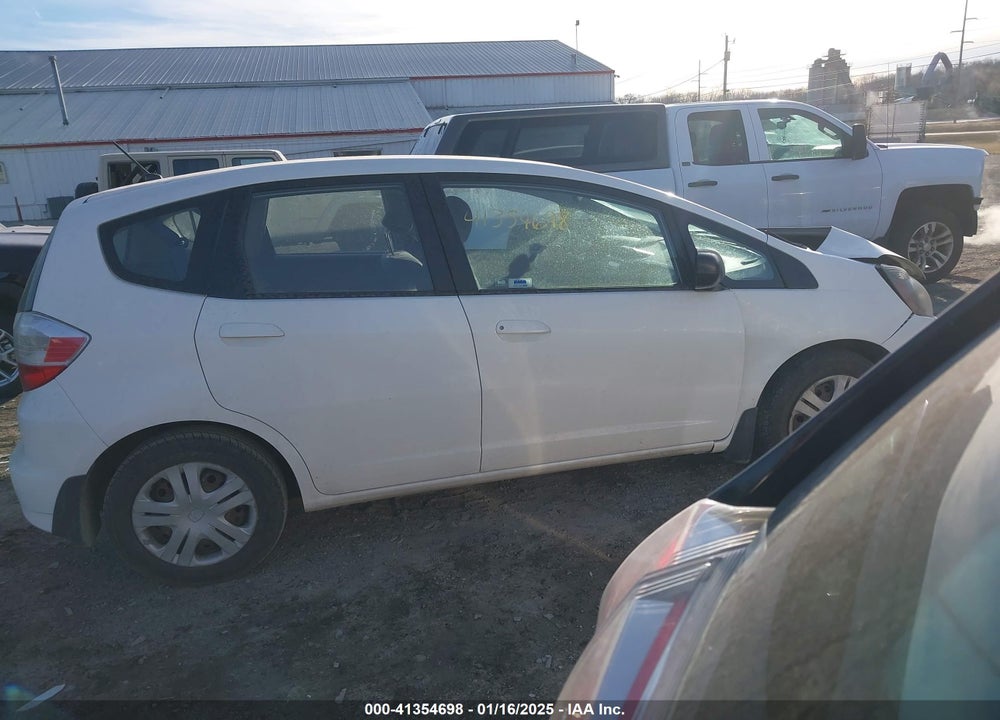 2009 HONDA FIT VIN: JHMGE88249S067463
