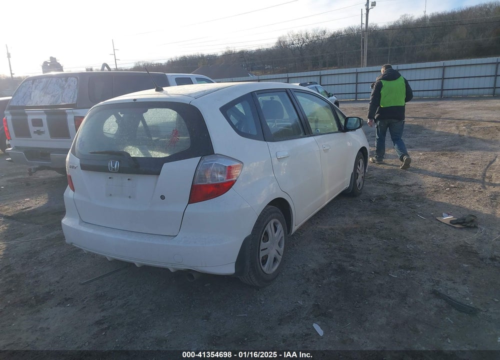2009 HONDA FIT VIN: JHMGE88249S067463