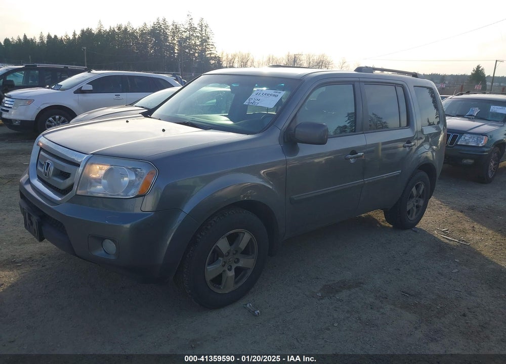 2011 HONDA PILOT EX-L VIN: 5FNYF4H51BB076890