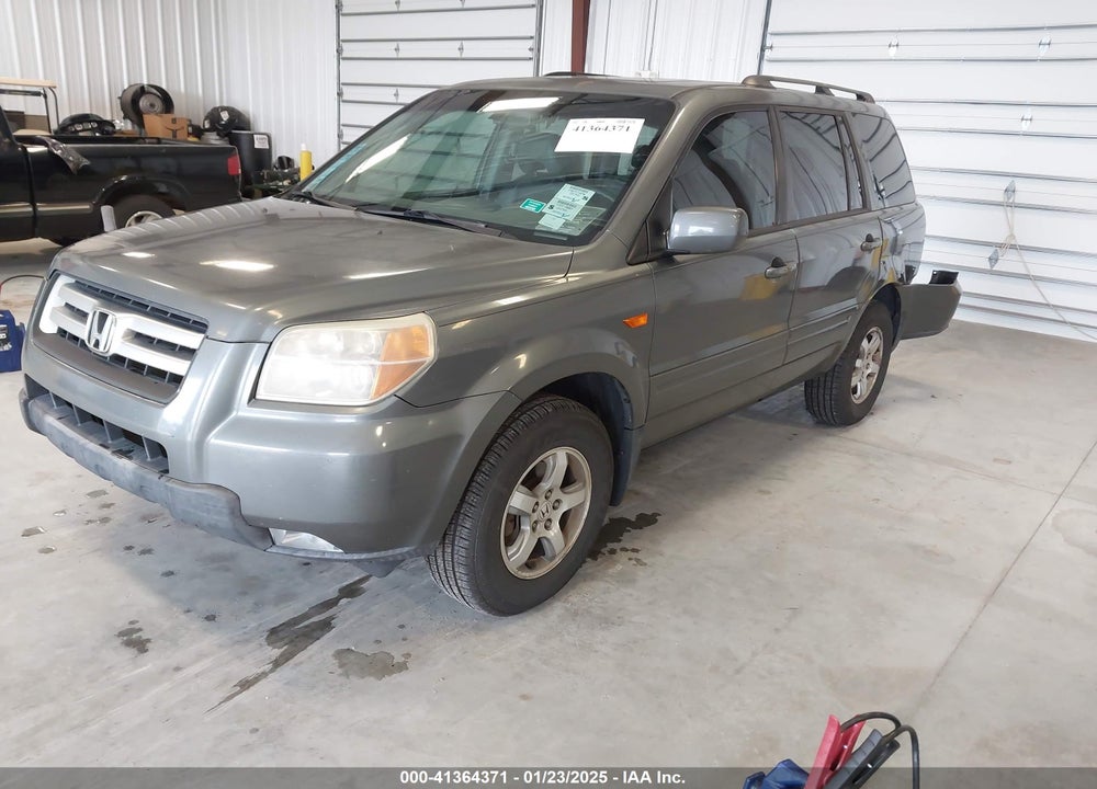 2007 HONDA PILOT EX-L VIN: 5FNYF28557B044410