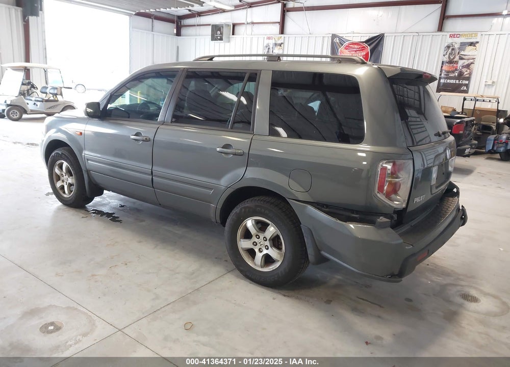 2007 HONDA PILOT EX-L VIN: 5FNYF28557B044410