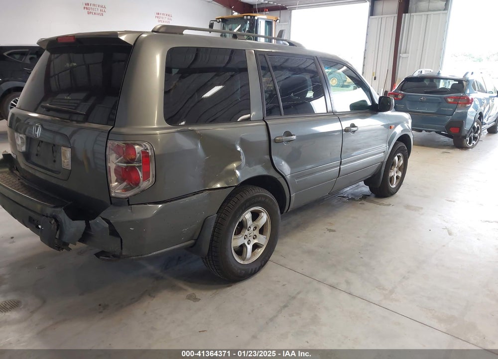 2007 HONDA PILOT EX-L VIN: 5FNYF28557B044410