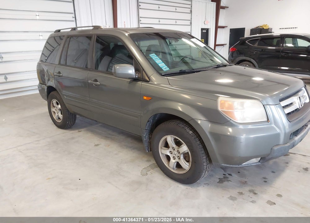 2007 HONDA PILOT EX-L VIN: 5FNYF28557B044410