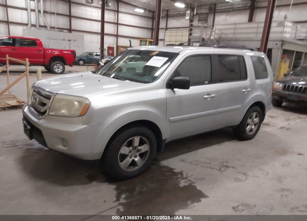2011 HONDA PILOT EX-L VIN: 5FNYF4H70BB012924