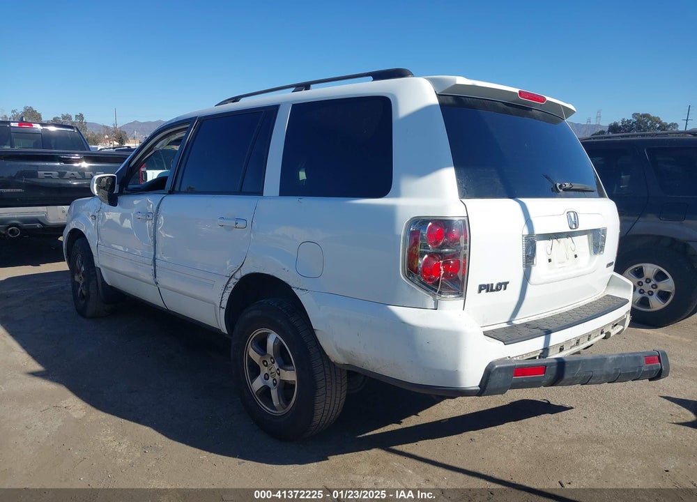 2007 HONDA PILOT EX-L VIN: 5FNYF18627B030693