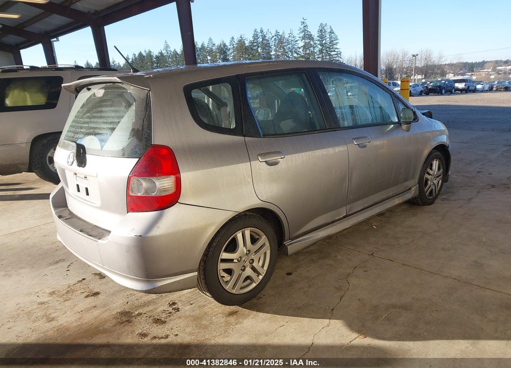 2007 HONDA FIT VIN: JHMGD38657S034509