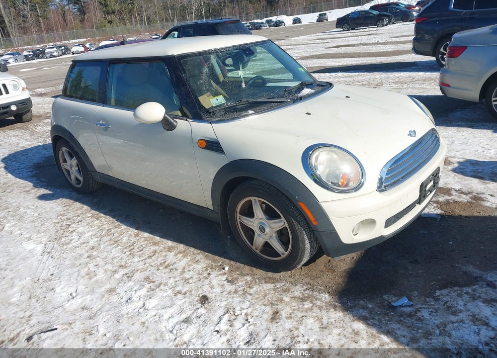 2007 MINI COOPER VIN: WMWMF33597TT52427