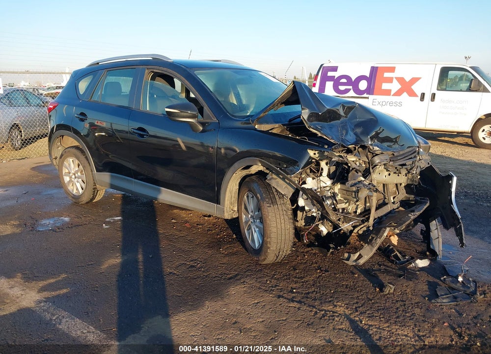 2016 MAZDA CX-5 SPORT VIN: JM3KE2BY4G0848084