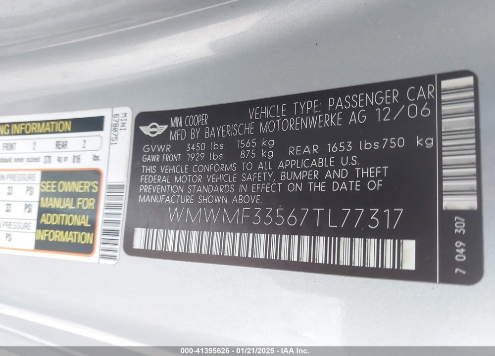 2007 MINI COOPER VIN: WMWMF33567TL77317