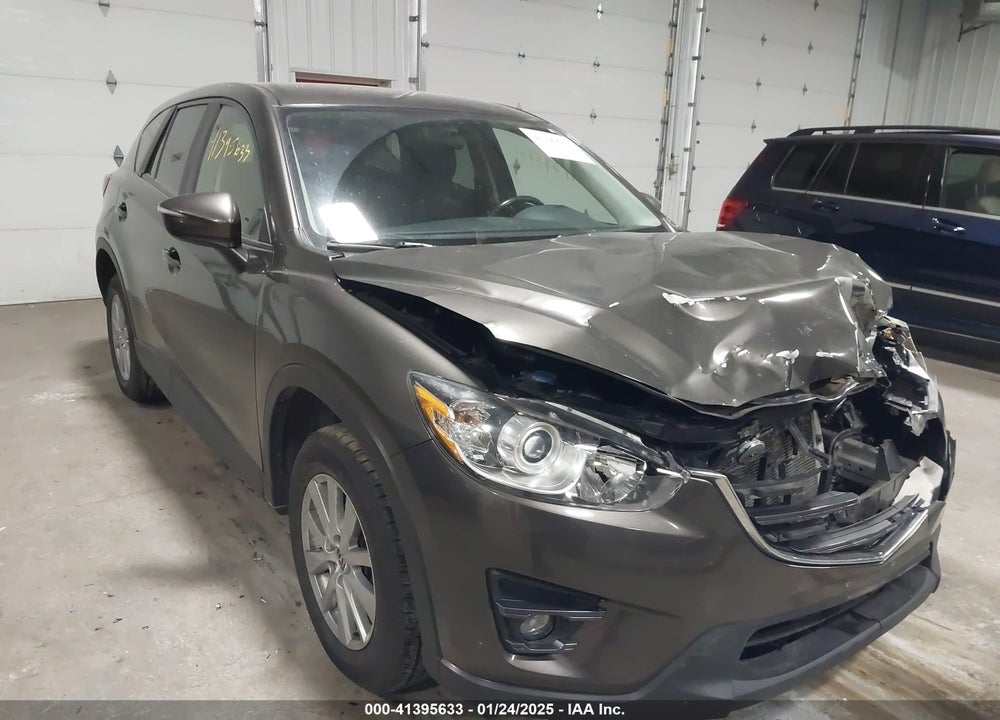 2016 MAZDA CX-5 TOURING VIN: JM3KE2CY7G0691052