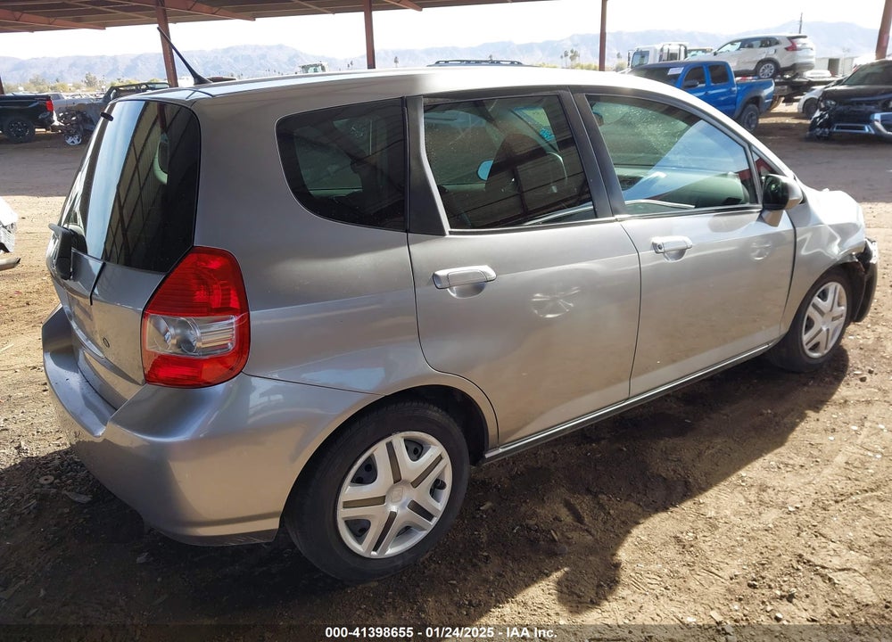 2007 HONDA FIT VIN: JHMGD37477S026170