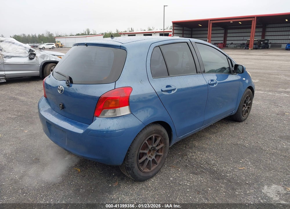 2009 TOYOTA YARIS VIN: JTDKT903295260026