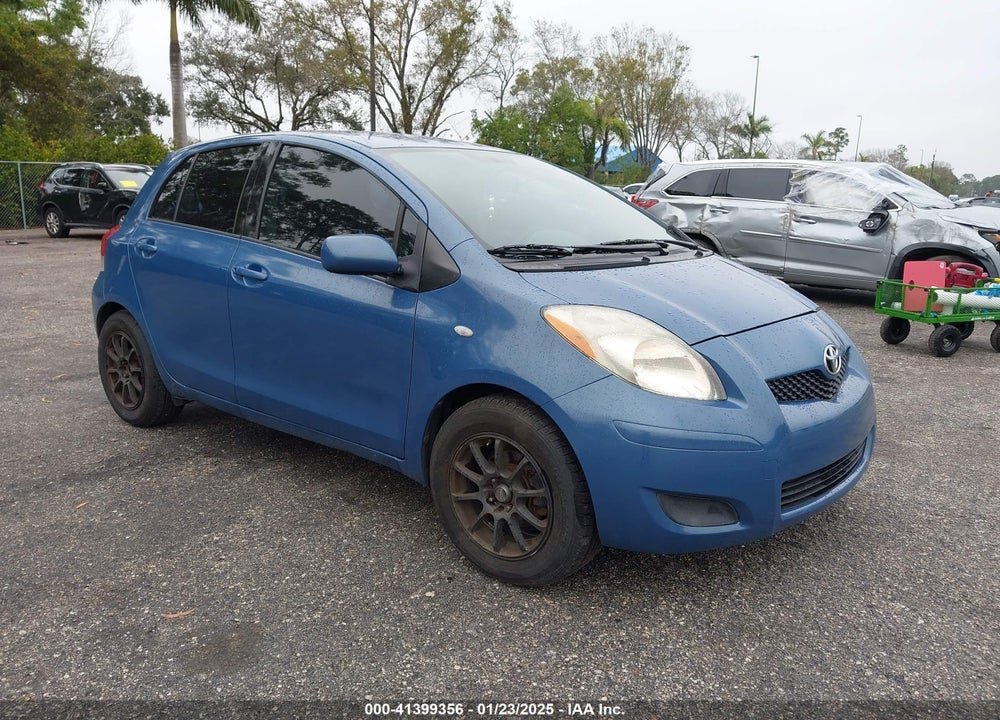 2009 TOYOTA YARIS VIN: JTDKT903295260026