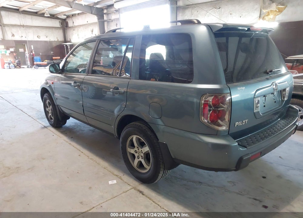 2007 HONDA PILOT EX-L VIN: 5FNYF28647B004098