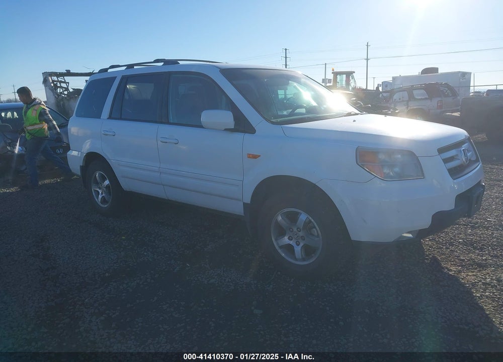2007 HONDA PILOT EX-L VIN: 5FNYF28507B035646