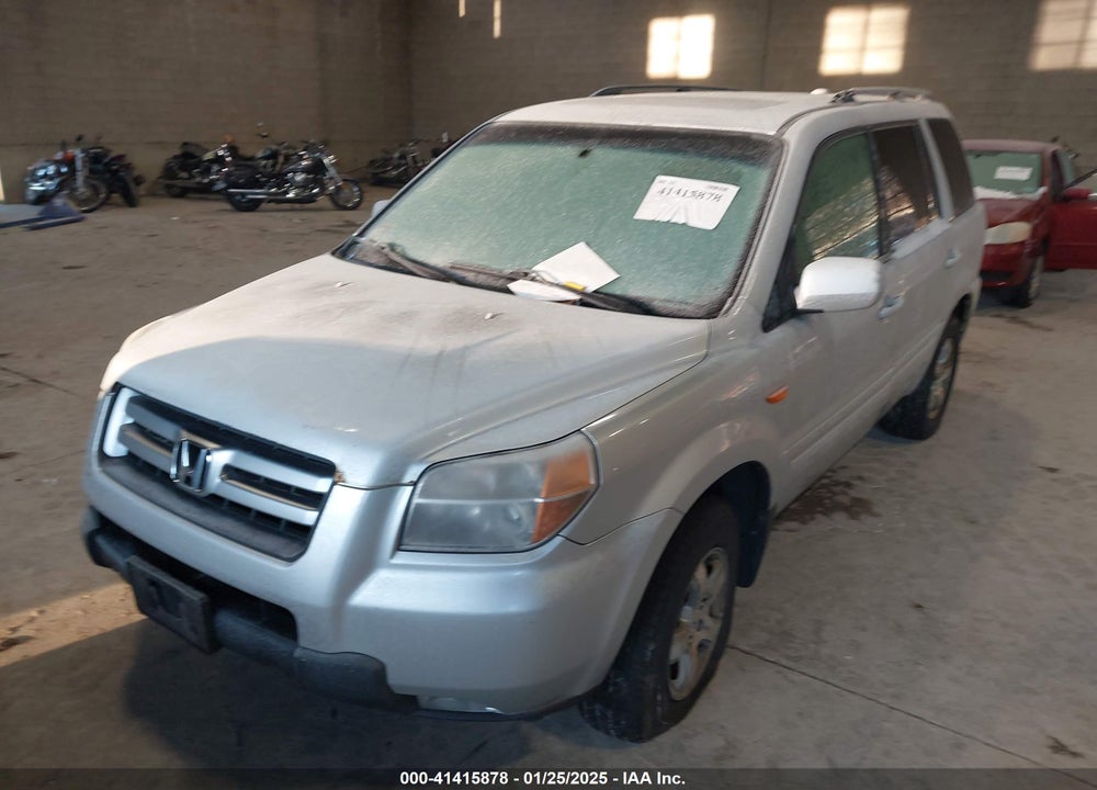 2007 HONDA PILOT EX-L VIN: 2HKYF18577H539820