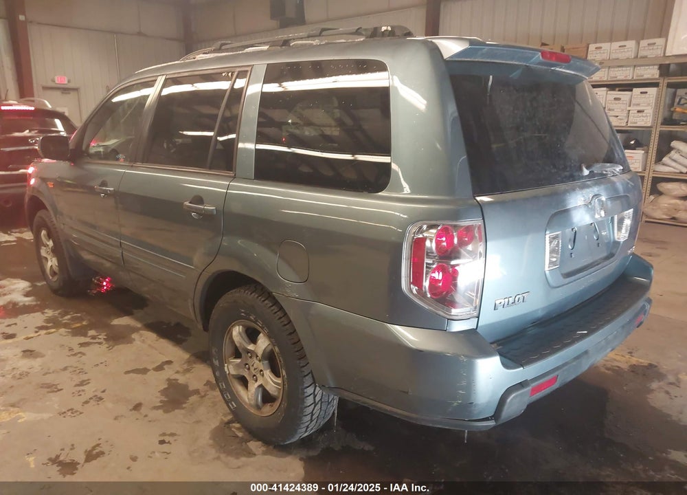 2007 HONDA PILOT EX-L VIN: 2HKYF185X7H517780