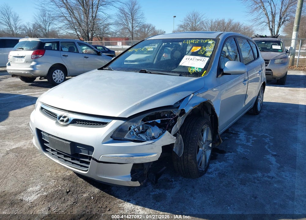 2009 HYUNDAI ELANTRA TOURING VIN: KMHDC86E99U041612