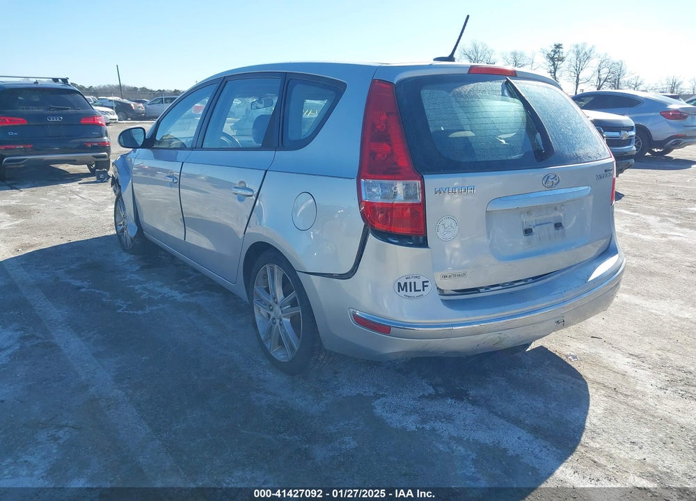 2009 HYUNDAI ELANTRA TOURING VIN: KMHDC86E99U041612