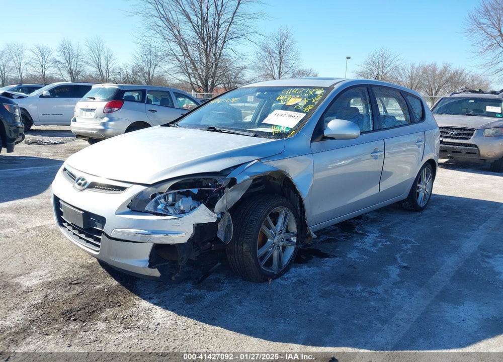 2009 HYUNDAI ELANTRA TOURING VIN: KMHDC86E99U041612