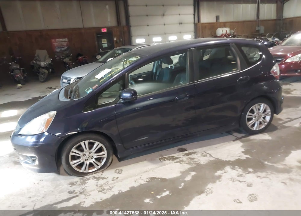 2009 HONDA FIT VIN: JHMGE88439S024847