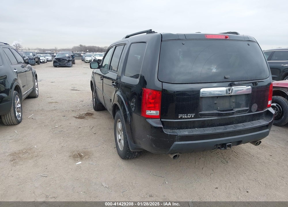 2011 HONDA PILOT EX-L VIN: 5FNYF3H50BB031613