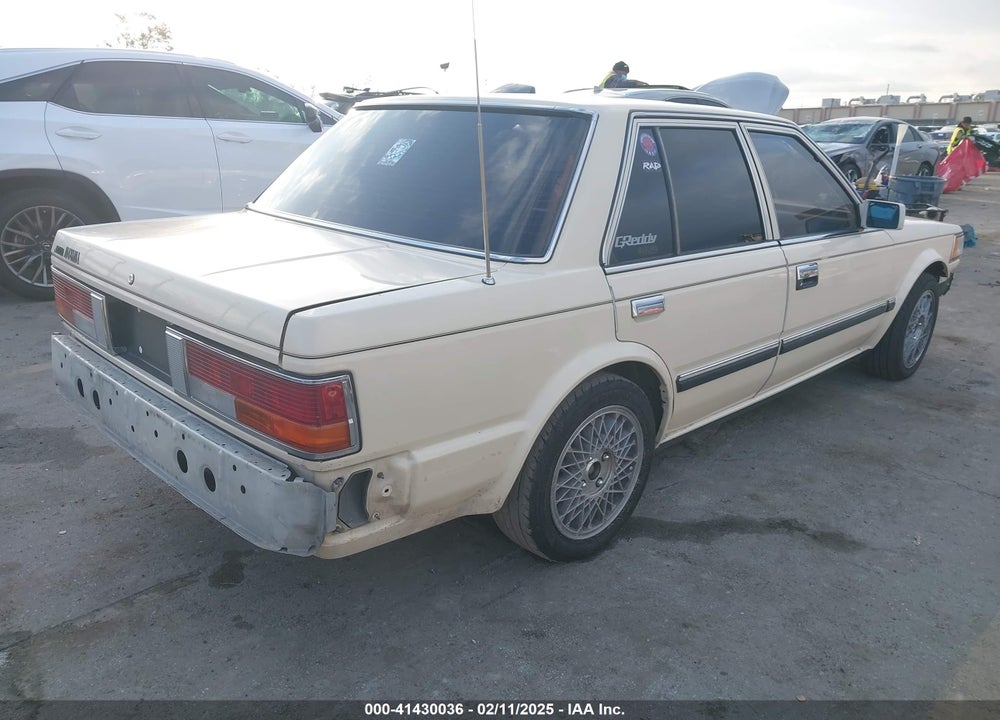 1986 NISSAN MAXIMA VIN: JN1HU11SXGT146012