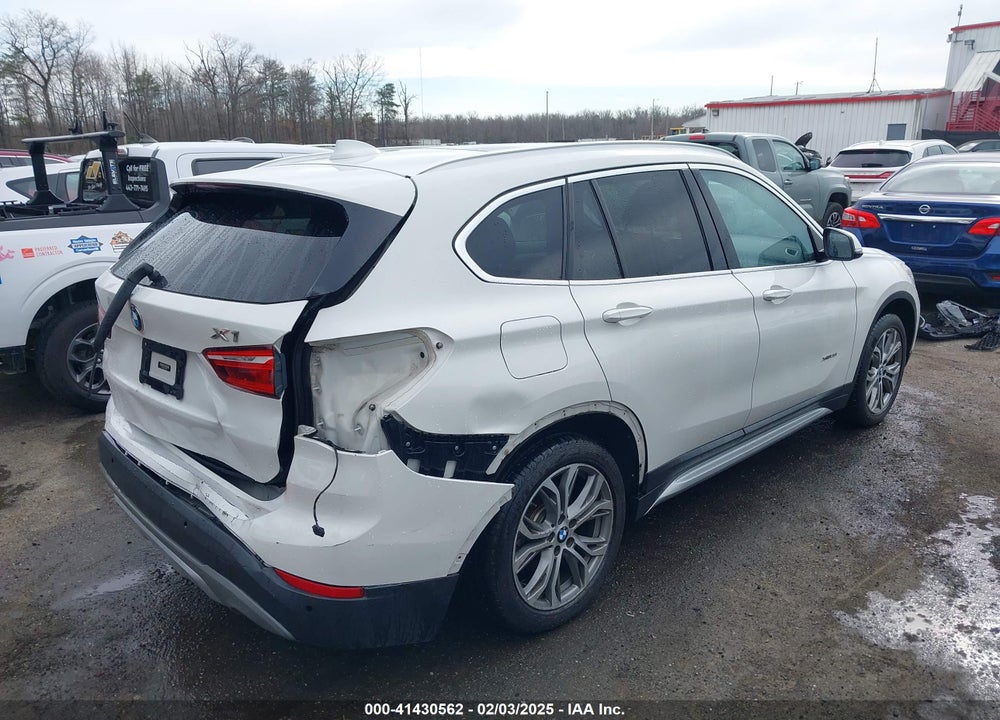 2017 BMW X1 VIN: WBXHT3C39H5F79883