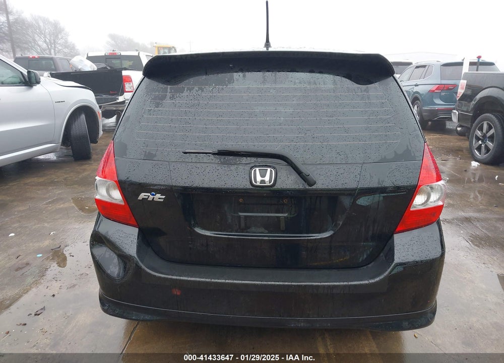 2007 HONDA FIT VIN: JHMGD38637S062633