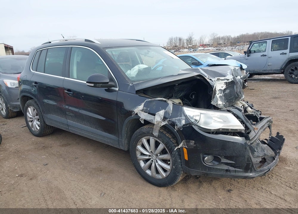 2011 VOLKSWAGEN TIGUAN SE VIN: WVGBV7AX1BW567294