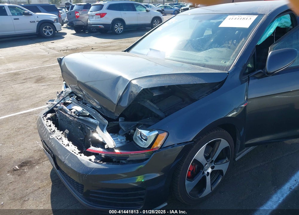 2015 VOLKSWAGEN GOLF GTI 2.0T S 4-DOOR VIN: 3VW4T7AU5FM084001