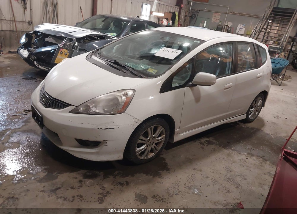2010 HONDA FIT VIN: JHMGE8H43AC011448