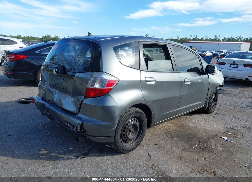 2012 HONDA FIT VIN: JHMGE8H3XCS008398