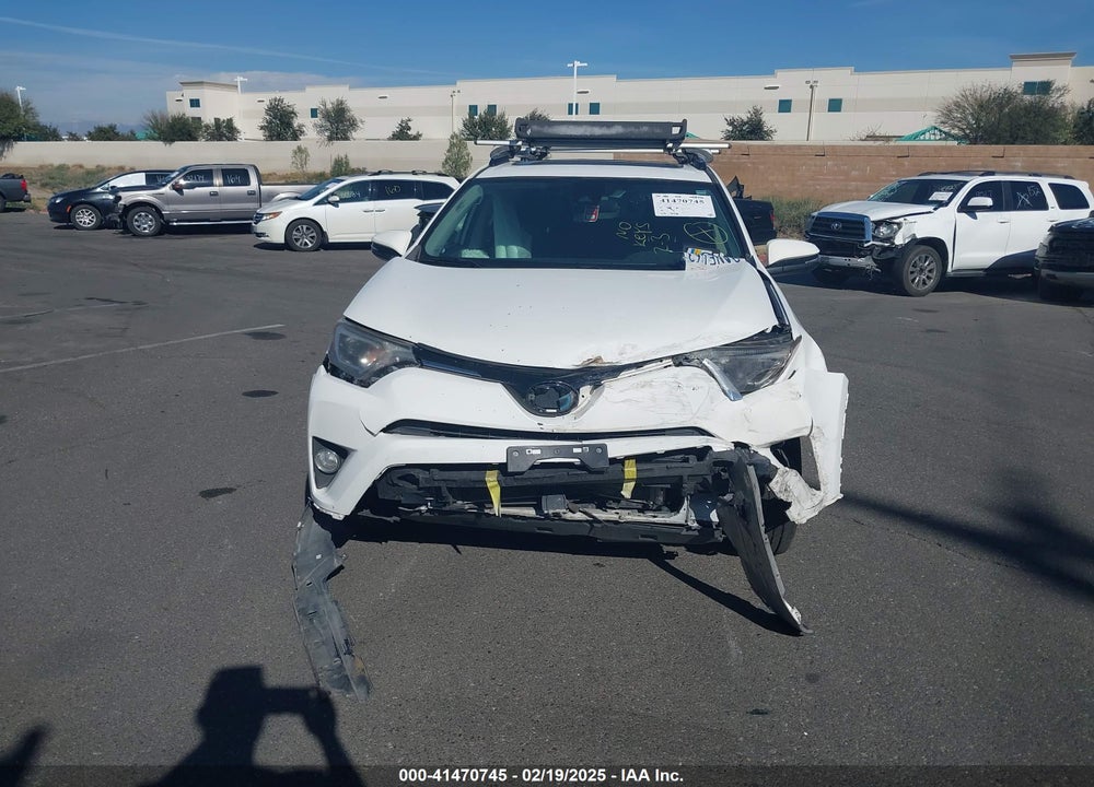 2018 TOYOTA RAV4 HYBRID XLE VIN: JTMRJREV2JD169623