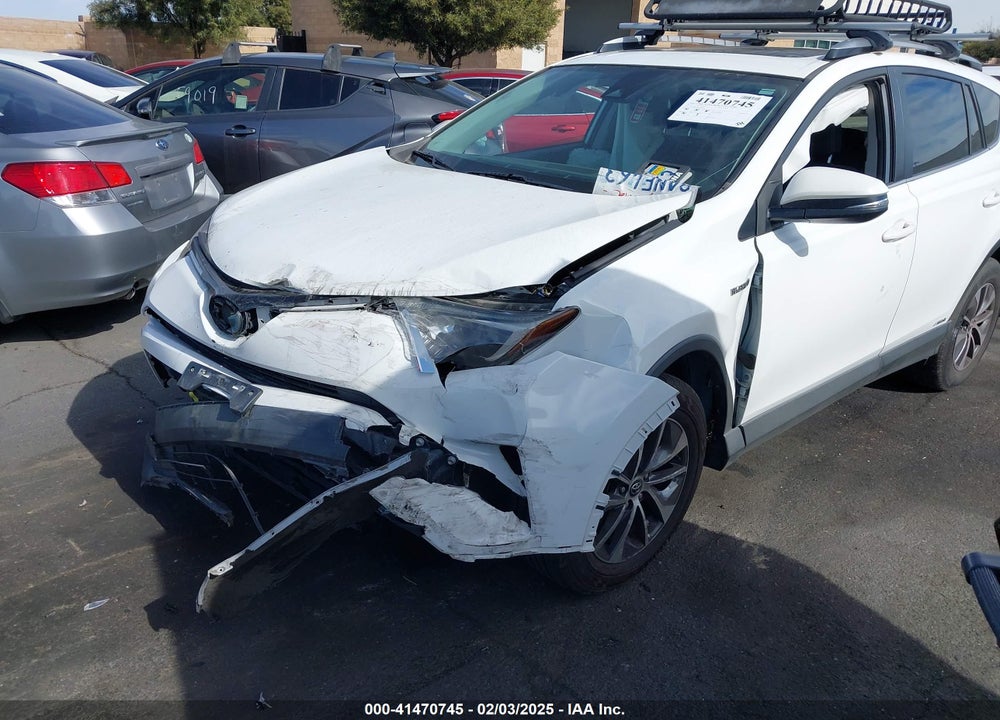 2018 TOYOTA RAV4 HYBRID XLE VIN: JTMRJREV2JD169623