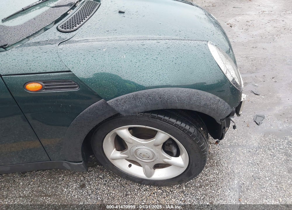 2006 MINI COOPER VIN: WMWRC33556TK70238