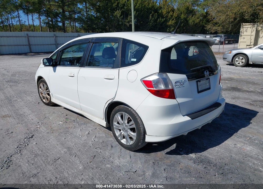2009 HONDA FIT SPORT VIN: JHMGE88449S014702