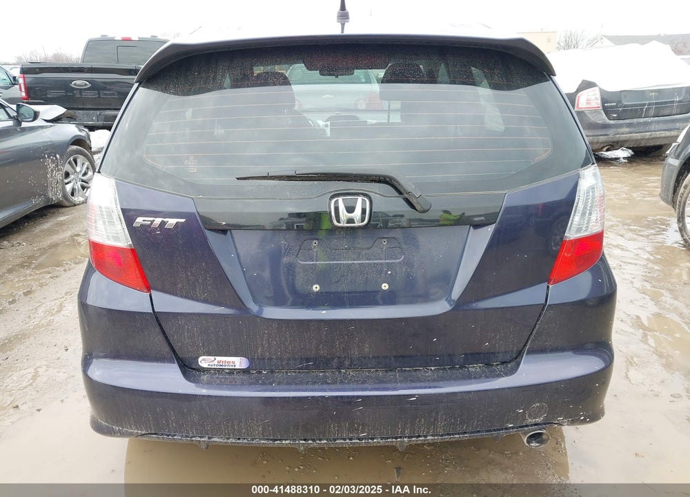 2009 HONDA FIT VIN: JHMGE88499S030345