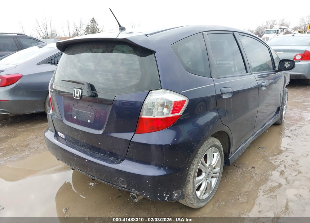 2009 HONDA FIT VIN: JHMGE88499S030345