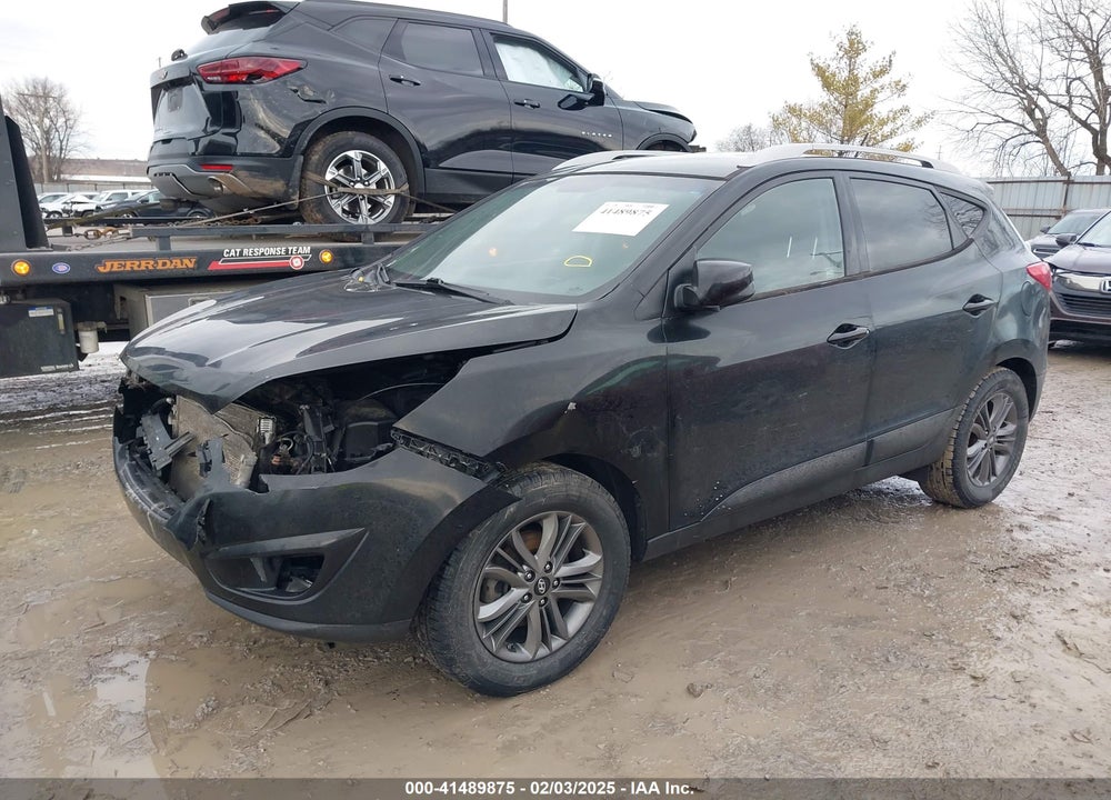 2014 HYUNDAI TUCSON SE VIN: KM8JU3AG0EU857856
