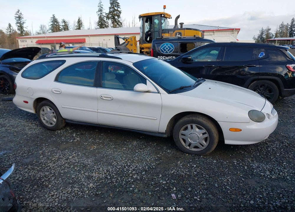 1999 FORD TAURUS VIN: 1FAFP58U5XG200924
