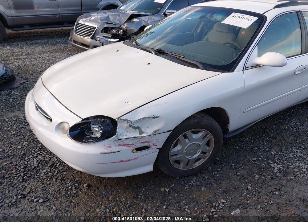 1999 FORD TAURUS VIN: 1FAFP58U5XG200924